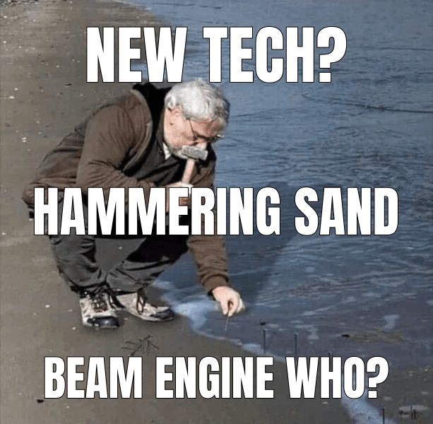 Guy Hammering Nails Into Sand meme about "The Beam Engine"